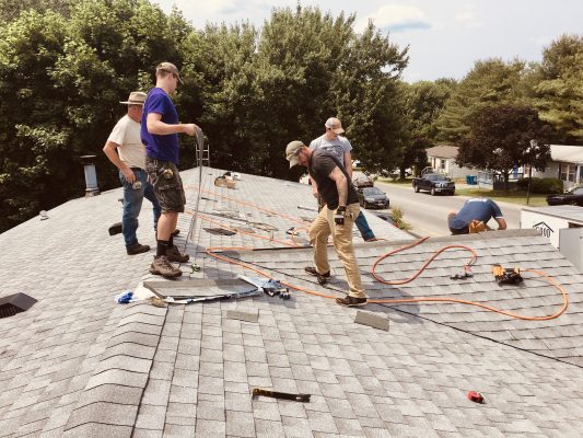 Image: Roofing Crew on Roof - RCV ACV roof insurance claims | Kirby Soar Insurance